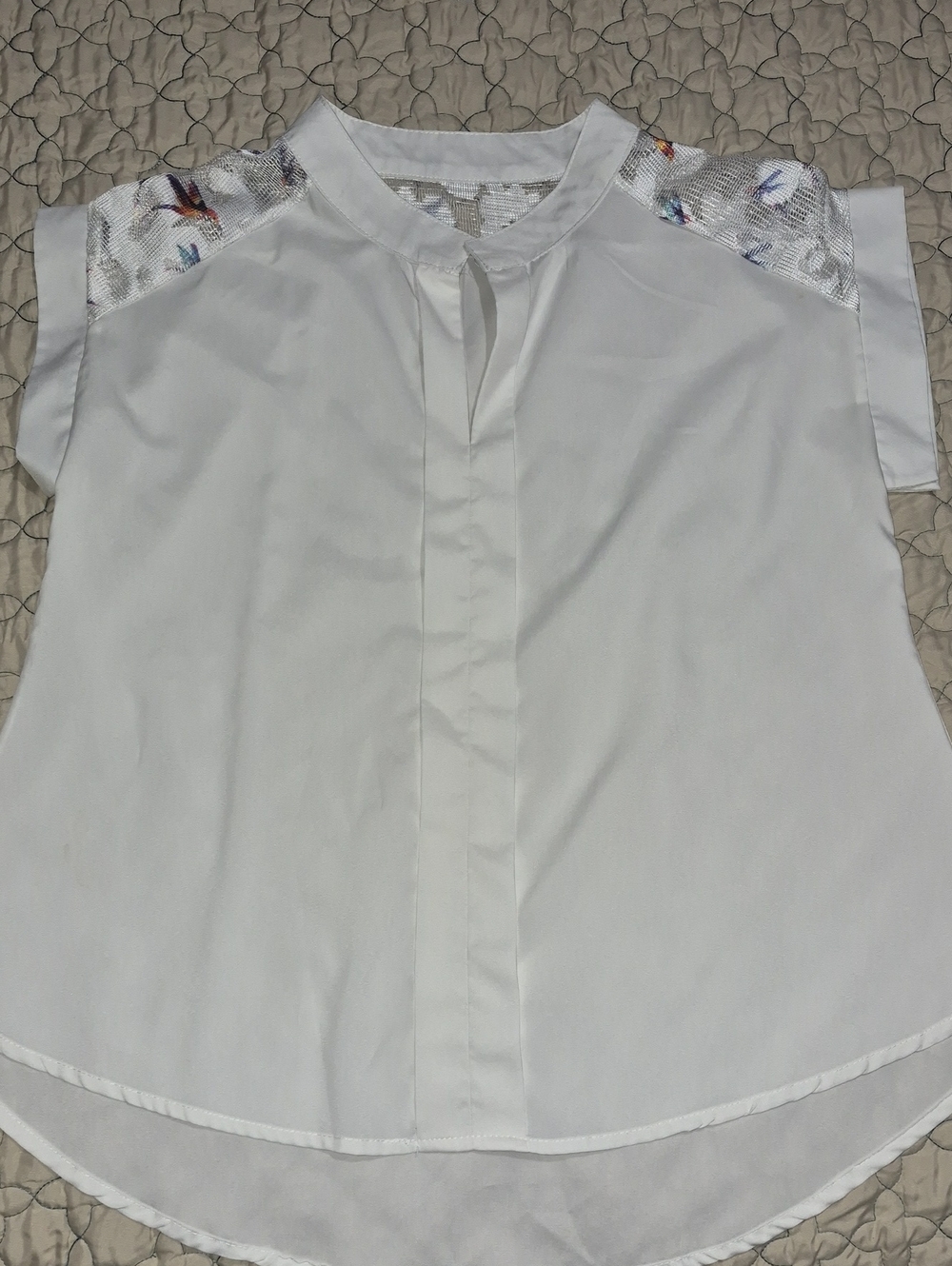 Elegant White Cap-Sleeve Blouse with Embroidered Shoulder Panels
